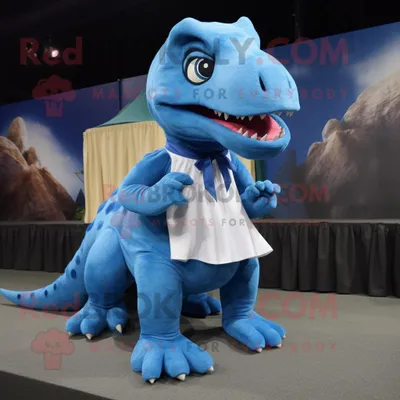 Productafbeelding van Karakter van het blauwe Tyrannosaurus mascotte REDBROKOLY kostuum gekleed met een wikkelrok en schoenclips