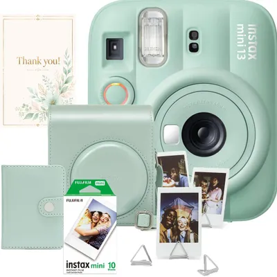 Produktbild von Fujifilm Instax Mini 13 Kamera-Set Lagoon Green – Sofortbildkamera Grün + 10er Film + Tasche + Fotoalbum + Fotohalter + Grußkarte