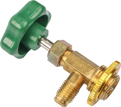 A close-up studio shot of a brass valve with a green handle.