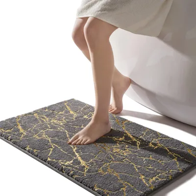 Zdjęcie produktu dla Antypoślizgowa mata do łazienki z złotymi paskami, 50x80 cm