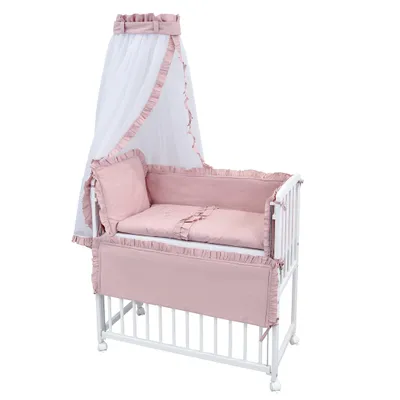 A baby crib with bedding and a canopy, presented on a white background.