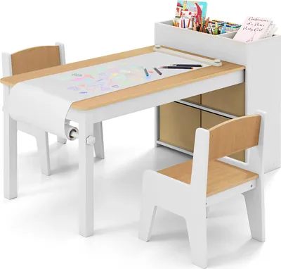 A children's art desk and chair set with a paper roll and storage compartments.