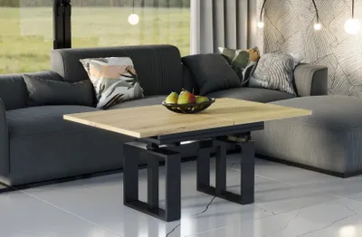 A modern living room with a couch, coffee table, and window.
