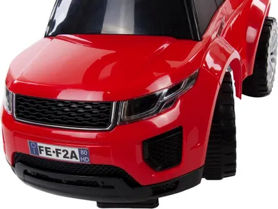 Close-up front view of a red toy car.
