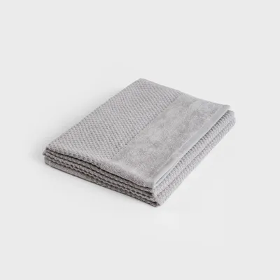 Produktbild von HOMLA NASIA Baumwollhandtuch grau 70x130 cm