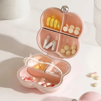 Image de Petite boîte de pilules portable avec 7 compartiments, idéale pour les voyages