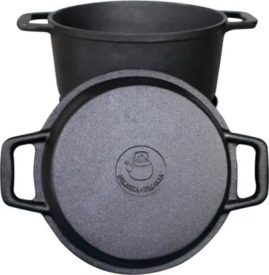 A black cast iron Dutch oven with its lid, shown from a slightly elevated angle.