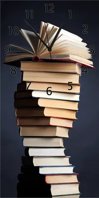 Produktbild von Wallario Design Wanduhr Bücherstapel aus Echtglas, Größe 30 x 60 cm