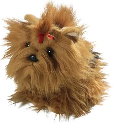 A plush toy Yorkshire Terrier with a red bow on its head, set against a white background.