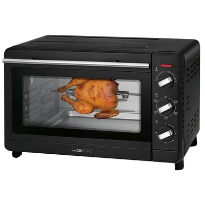 A black Clatronic multi-oven with a roasted chicken inside on a rotisserie.