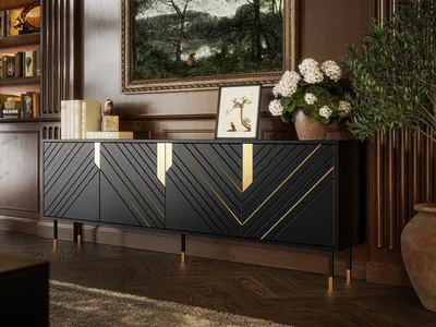 A luxurious living room setting with a black and gold sideboard as the focal point.