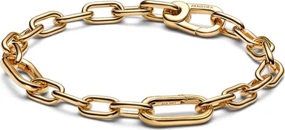 A gold-colored chain bracelet is displayed against a white background.