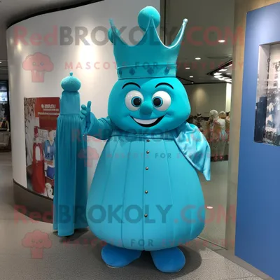 Zdjęcie produktu dla Postać REDBROKOLY w kostiumie maskotki turkusowej królowej ubrana w kombinezon i czapki