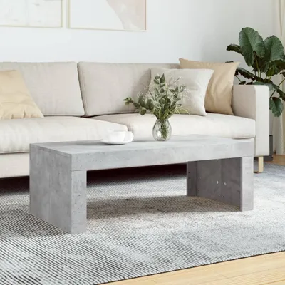 A modern living room scene with a couch and coffee table.