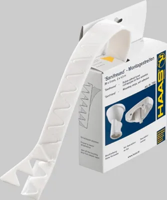 A roll of white mounting strips is shown emerging from a cardboard box. The box has product information and branding printed on it.