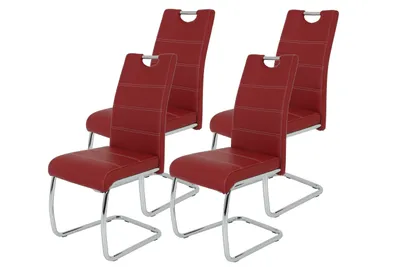 Four red dining chairs with chrome legs are arranged on a white background.