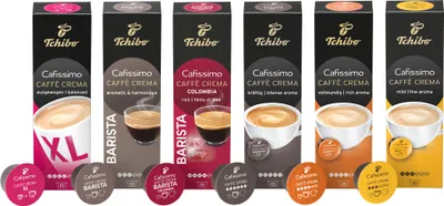 A collection of Tchibo Cafissimo coffee capsule boxes and individual capsules.