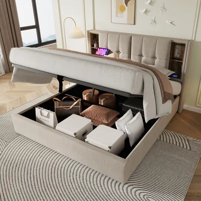 A bed with its storage compartment open, revealing various items inside, in a bedroom setting.
