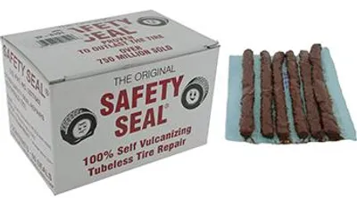 Image de Boîte contenant 60 renforts pour la réparation des pneus tubeless.