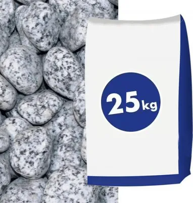 A bag of gravel next to a pile of gravel.