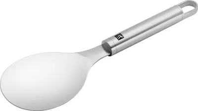 A stainless steel rice spoon against a white background.