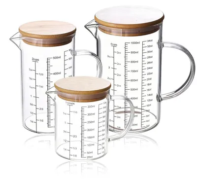Zdjęcie produktu dla Zestaw szklanych miarek, 3 sztuki, pojemność: 350 ml, 500 ml, 1000 ml. Wykonane ze szkła borosilikatowego, z uchwytem i podziałką