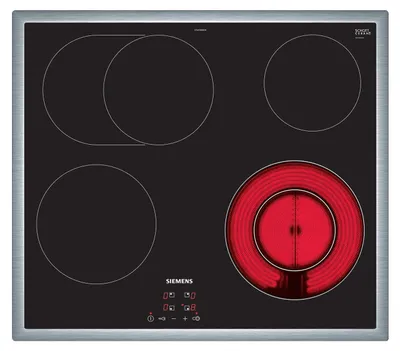 A top-down view of a black glass ceramic electric hob with four cooking zones, one of which is glowing red.