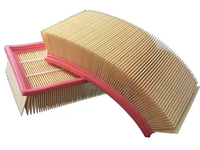 Two beige air filters with pink frames are shown against a white background.