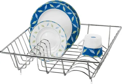 A chrome dish rack holding two plates and a mug.