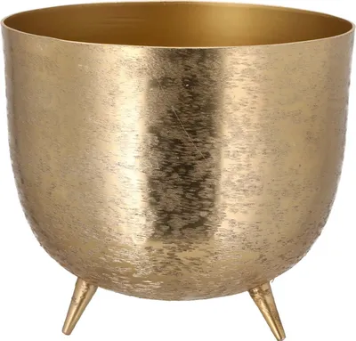 A gold-colored planter pot with three legs.