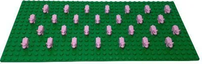 A green Lego baseplate with multiple pink pig minifigures arranged on it.