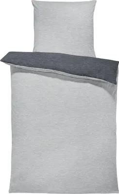 A folded duvet cover and pillowcase set, displayed flat against a white background.