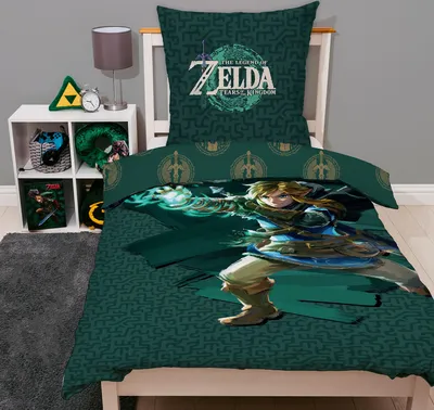 A bedroom scene featuring a bed with Zelda-themed bedding, a nightstand with a lamp and clock, and shelves with decorative items.