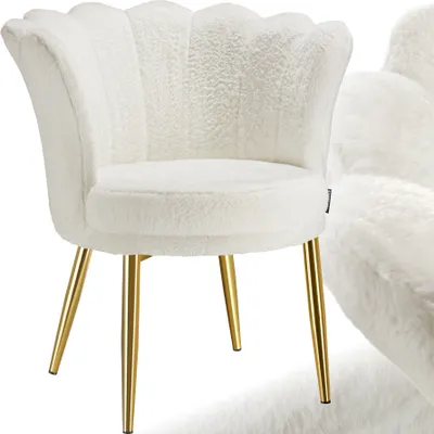 A white fluffy armchair with gold legs.