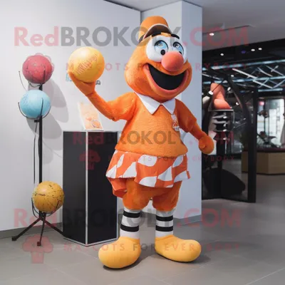 Productafbeelding van Peach Clown Fish mascotte REDBROKOLY kostuum karakter gekleed met een korte broek en manchetknopen