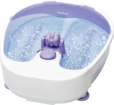 A white and purple foot bath with water and bubbles.