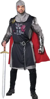 A man dressed in a medieval knight costume, holding a sword.