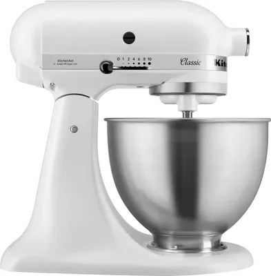 A white KitchenAid Classic stand mixer with a silver bowl is shown against a white background.