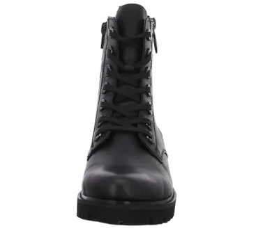 A front view of a black lace-up boot.