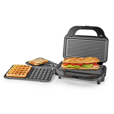 A multi-grill with interchangeable plates for waffles, sandwiches, and grilling, shown with a sandwich and waffles.