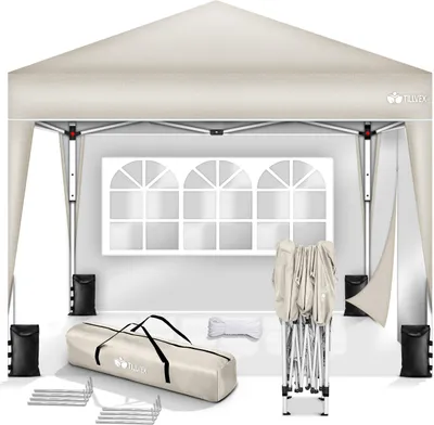 A pop-up canopy tent and its accessories are displayed against a white background. The tent is set up, and the accessories, including a carrying bag, folded frame, weights, and stakes, are arranged around it.