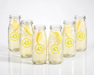 Produktbild von Licor 43 Milchflasche 6er Set – Cocktailgläser im Milchflaschen-Design für Likör, Longdrinks & Desserts | Glasbecher mit Licor 43 Motiv