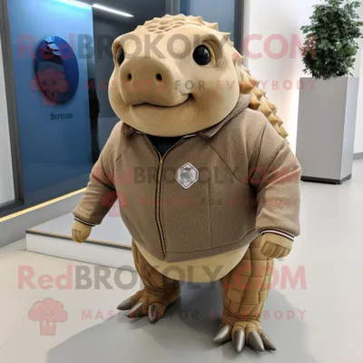 Immagine prodotto di Personaggio in costume della mascotte REDBROKOLY di Glyptodon marrone chiaro vestito con un maglione e gemelli
