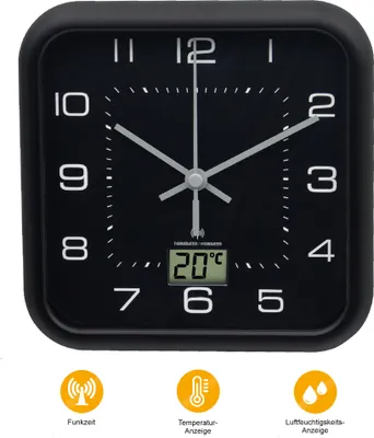 A black square alarm clock with a digital display showing the temperature.