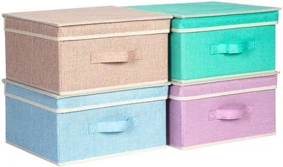 Imagen del producto de Uniqoos® Juego de 4 cajas de almacenamiento plegables, de 33,5 x 31,75 x 17,5 cm, con tapa y asa, de cartón/lino, en colores rosa claro/verde claro/azul claro/lila claro