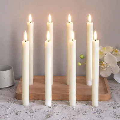 Immagine prodotto di 8 candele a LED a forma di bastoncino, luce bianco caldo, 25 cm, senza fiamma, alimentate a batteria, ideali per decorazioni natalizie, matrimoni, feste ed eventi, colore avorio