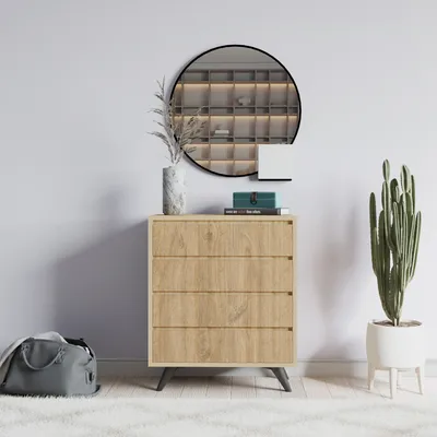 A chest of drawers with decorative items and a plant.