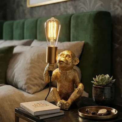Immagine prodotto di Lampada da tavolo a forma di scimmia, in resina, 17x14,5x25 cm, color oro, design Mauro Ferretti