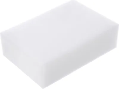 A single white sponge is shown from a diagonal angle against a white background.