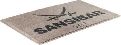 Produktbild von Sansibar Badematte mit Sansibar Logo Schriftzug, rutschhemmend beschichtet, Höhe 20 mm, fußbodenheizungsgeeignet, strapazierfähig, schnell trocknend, Polyacryl, 60x100 cm